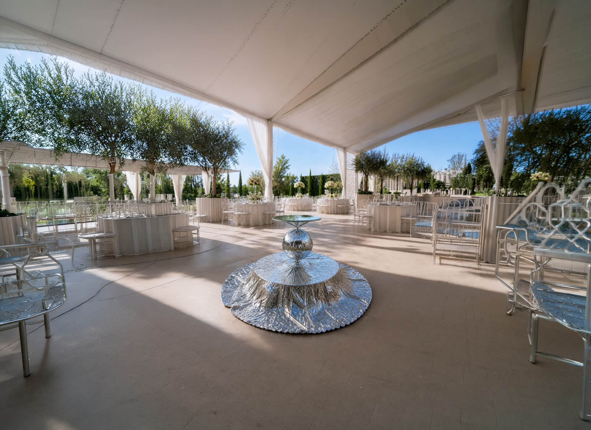 Disco Luxe Platform — mirrored rotating stage at an outdoor venue